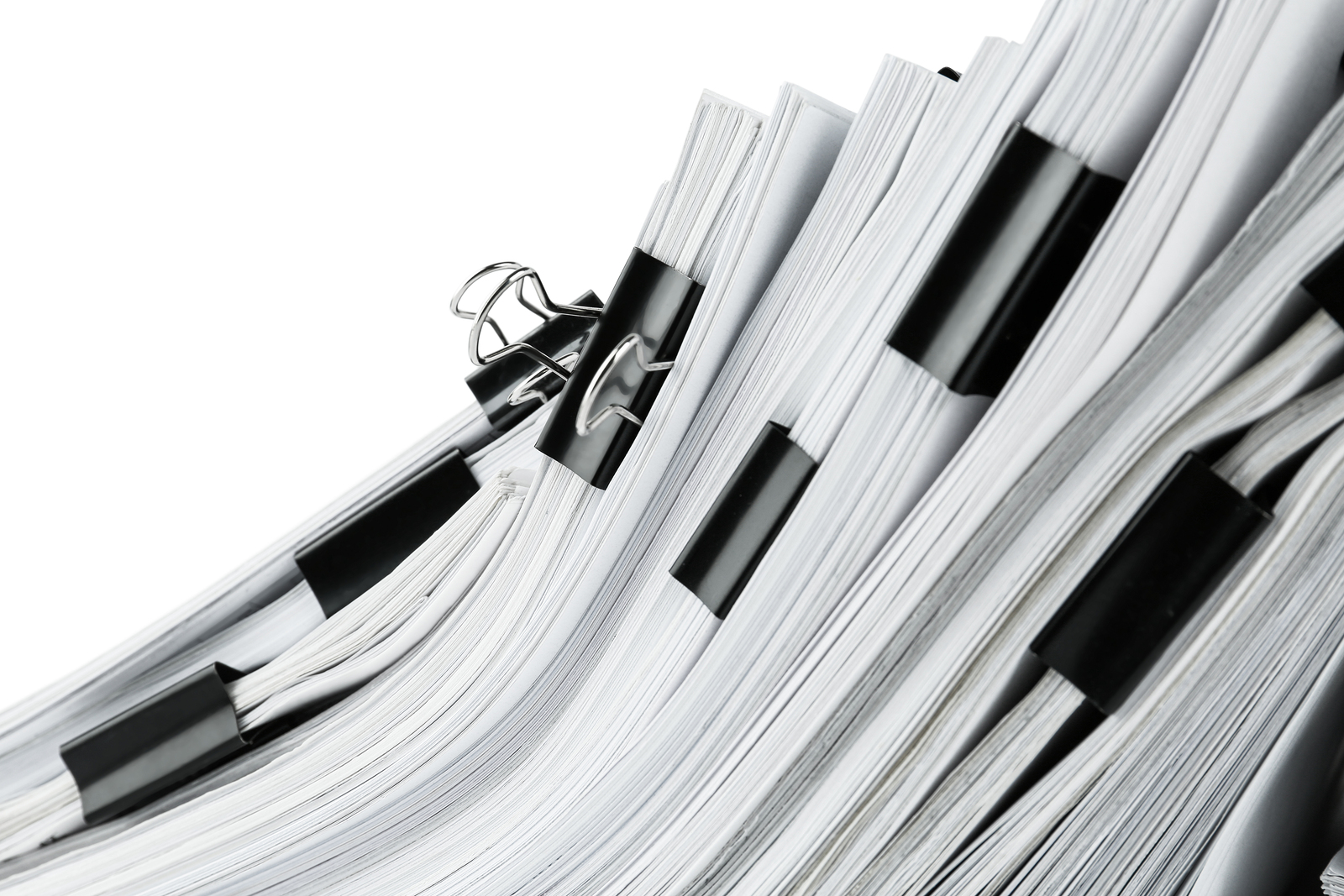 Pile of documents with binder clips, closeup